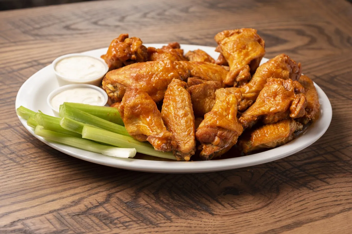 Anchor Bar signature dishes World Famous Wings, Sampler Platter, Buffalo Chicken Salad, Spaghetti & Meatballs 